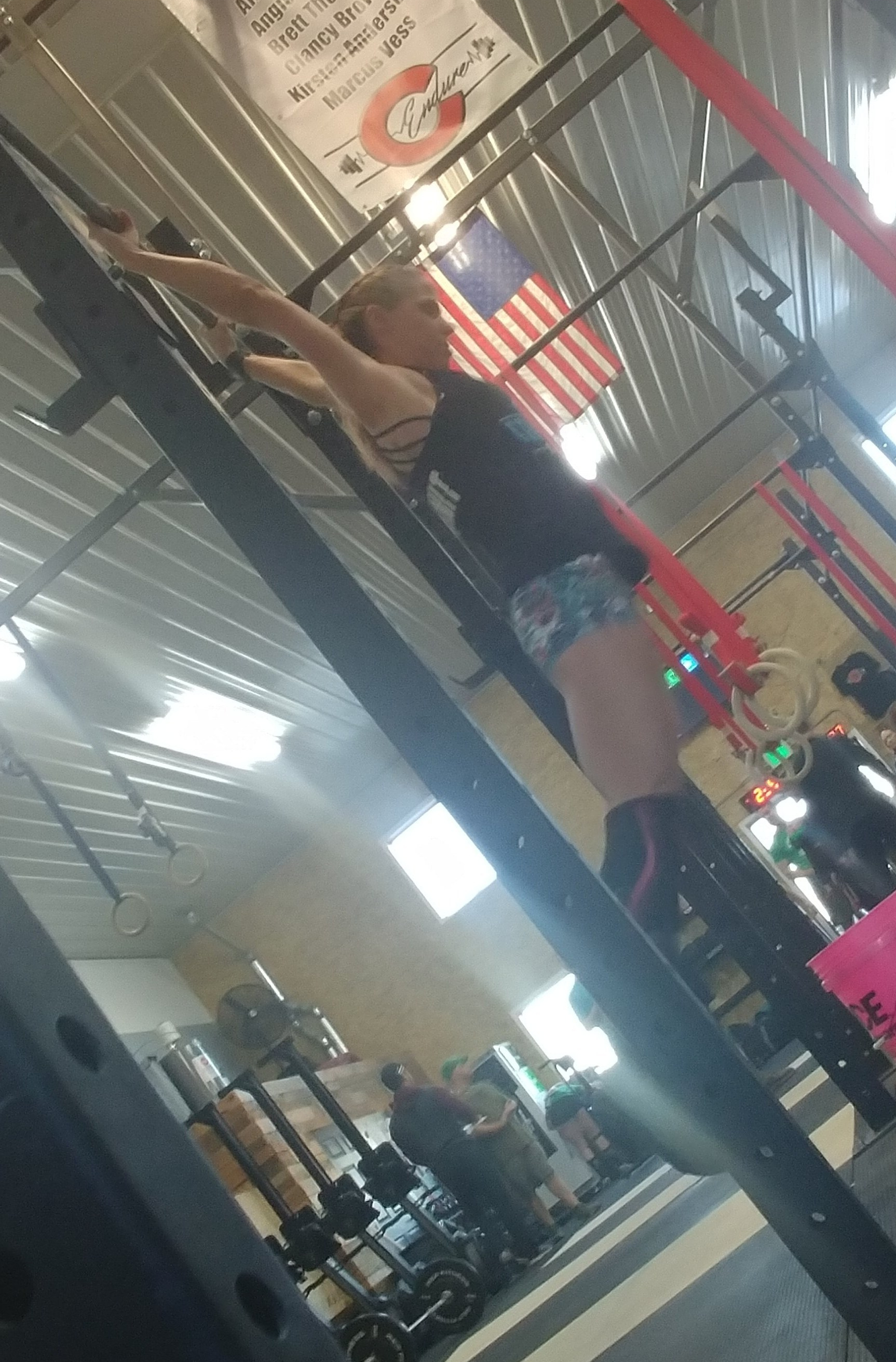 hot crossfit mom doing CrossFit Open Workout 19.5 Chest to bar pull ups in Colorado