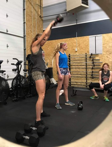 Crossfitmomm working out at home in Colorado