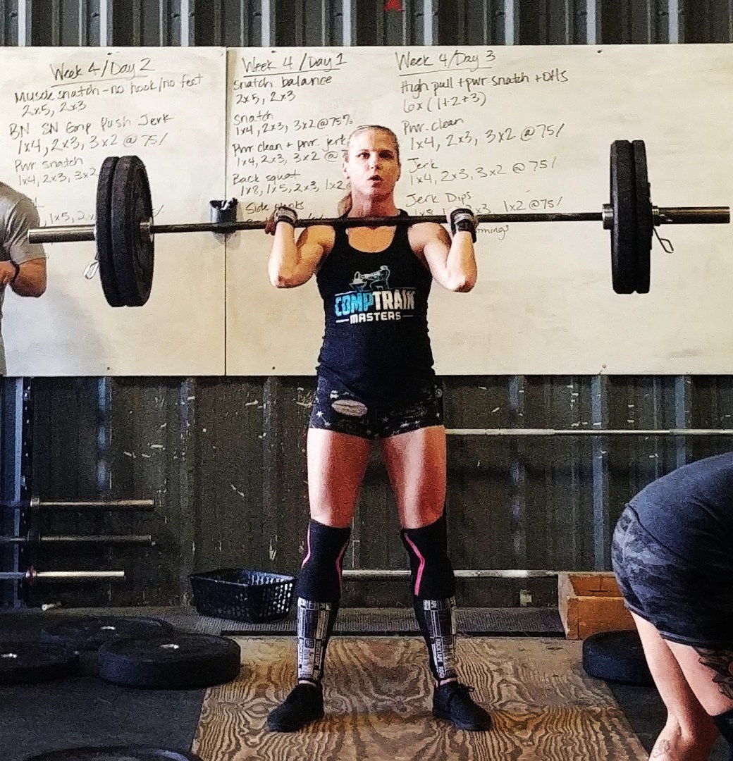 Hotcrossfitchick doing thrusters at crossfit competition in colorado springs