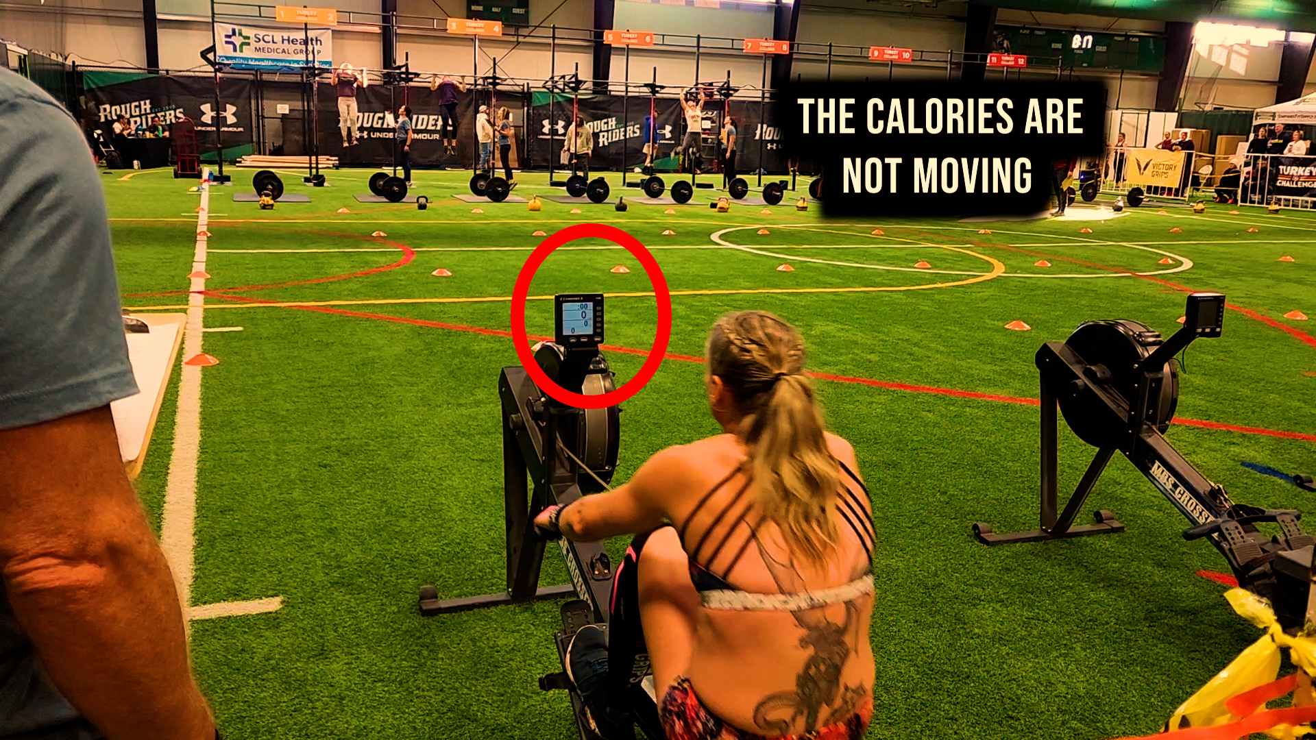 rower breaks during a workout at a crossfit competition www.crossfitmomm.com